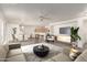 Open-concept living area showcases a modern design with tile floors, neutral decor, and lots of space at 999 S Sabino Dr, Gilbert, AZ 85296