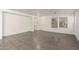 Large living room with tile floors and abundant natural light at 999 S Sabino Dr, Gilbert, AZ 85296