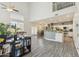 Open floor plan with high ceilings, vinyl plank flooring, and access to the kitchen at 1014 S Porter St, Gilbert, AZ 85296
