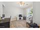 Spacious living room with wood-look floors, entertainment center, and ample natural light at 1014 S Porter St, Gilbert, AZ 85296