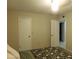 Carpeted bedroom with a ceiling fan and access to other rooms at 10201 S 49Th St, Phoenix, AZ 85044