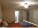 Main bedroom featuring carpet flooring and access to an ensuite bathroom at 10201 S 49Th St, Phoenix, AZ 85044