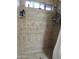 Shower features tile surround, built-in shelves, and showerhead with convenient window at 10201 S 49Th St, Phoenix, AZ 85044