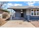 Attached carport featuring stylish support beams and a convenient covered parking area at 1027 S Lola Ln, Tempe, AZ 85281