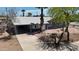 Charming single-story home with a covered carport and well-manicured front yard at 1027 S Lola Ln, Tempe, AZ 85281