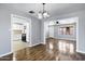 Bright living room featuring hardwood floors and natural light at 1027 S Lola Ln, Tempe, AZ 85281