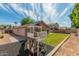 Backyard featuring a play structure and plenty of space for Gathering activities at 1028 W Chilton Ave, Gilbert, AZ 85233