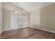 Inviting room featuring modern flooring, neutral walls, and bright, shuttered windows at 1028 W Chilton Ave, Gilbert, AZ 85233