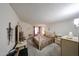 Spacious bedroom featuring neutral carpet, walk in closet, sitting area and decorative touches at 10401 W Loma Blanca Dr, Sun City, AZ 85351