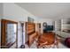 Living room and dining area, with built-in shelving at 10401 W Loma Blanca Dr, Sun City, AZ 85351