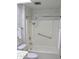 Bathroom with a shower and tub combination with a white shower curtain at 10428 W Camelot Cir, Sun City, AZ 85351