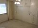 Bedroom with a large closet and window with blinds at 10428 W Camelot Cir, Sun City, AZ 85351
