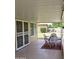 Covered patio with outdoor seating, perfect for enjoying the backyard view at 10428 W Camelot Cir, Sun City, AZ 85351