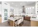 Spacious kitchen with an island and bar seating, stainless steel appliances, and ample counter space at 11662 E Parkview Ln, Scottsdale, AZ 85255