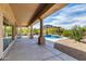 Stunning pool and patio area with mountain views, perfect for outdoor entertaining and relaxation at 11662 E Parkview Ln, Scottsdale, AZ 85255