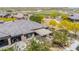 Aerial view of a private backyard featuring a covered patio with outdoor seating and manicured landscaping at 12325 S 179Th S Ave # 0, Goodyear, AZ 85338