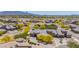 An aerial view shows this beautiful desert home is part of a vibrant community with mountain views and lush landscape at 12325 S 179Th S Ave # 0, Goodyear, AZ 85338