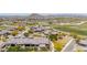 Aerial view of a community with golf course views, desert landscaping, and tile-roofed homes at 12325 S 179Th S Ave # 0, Goodyear, AZ 85338