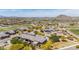Aerial view of luxury homes in a golf course community with desert landscaping and mountain views at 12325 S 179Th S Ave # 0, Goodyear, AZ 85338