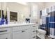 Well-lit bathroom with a dual sink vanity, white cabinets, modern fixtures and bright white color palette at 12325 S 179Th S Ave # 0, Goodyear, AZ 85338