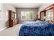 Spacious bedroom with wooden furniture and lots of natural light at 12325 S 179Th S Ave # 0, Goodyear, AZ 85338