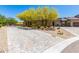 Charming front exterior with desert landscaping, a patterned paver driveway, and a well-maintained facade at 12325 S 179Th S Ave # 0, Goodyear, AZ 85338