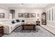 Well-lit living room featuring a sectional sofa, area rug, and decorative furnishings at 12325 S 179Th S Ave # 0, Goodyear, AZ 85338