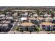 Aerial view of a community featuring modern, multi-story townhomes with well-maintained streets and landscaping at 1250 N Abbey Ln # 275, Chandler, AZ 85226