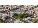 Wide aerial perspective featuring a neighborhood pool and recreation area, perfect for active community living at 1250 N Abbey Ln # 275, Chandler, AZ 85226