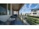 Inviting outdoor balcony space featuring modern seating, grill, and stylish outdoor lighting, perfect for relaxation at 1250 N Abbey Ln # 275, Chandler, AZ 85226