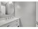 Well-lit half bathroom with a modern sink, faucet, and vanity with plenty of storage at 1250 N Abbey Ln # 275, Chandler, AZ 85226