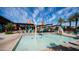 Splash pad area at the community pool offering a fun and safe water play area for children and families at 1250 N Abbey Ln # 275, Chandler, AZ 85226