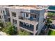 Modern townhome with multi-level balconies, showcasing contemporary design and outdoor living spaces at 1250 N Abbey Ln # 275, Chandler, AZ 85226