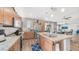 Modern kitchen with stainless steel appliances, granite countertops, and eat-in island at 1250 N Abbey Ln # 275, Chandler, AZ 85226