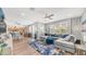 Cozy living room with a large sectional sofa, wood floors, and abundant natural light at 1250 N Abbey Ln # 275, Chandler, AZ 85226