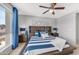 Well-lit main bedroom featuring a decorative ceiling fan, furnishings, and an exterior view at 1250 N Abbey Ln # 275, Chandler, AZ 85226