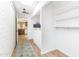 Bright hallway with natural light, laundry area, and convenient access to the kitchen at 12739 W Prospect Dr, Sun City West, AZ 85375