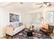 Comfortable sitting room with a soft couch and ample natural light at 12739 W Prospect Dr, Sun City West, AZ 85375
