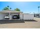 Open carport with ample parking for two vehicles, providing convenient access to the home at 13418 N 108Th Dr, Sun City, AZ 85351