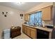 Kitchen with wood cabinets and countertops at 13418 N 108Th Dr, Sun City, AZ 85351