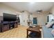 Living room features media center and ample seating space at 13418 N 108Th Dr, Sun City, AZ 85351