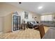 Cozy living room features comfortable seating and natural light from large windows at 13418 N 108Th Dr, Sun City, AZ 85351