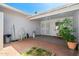 Inviting patio area with brick flooring, neutral tones, and access from the residence at 13418 N 108Th Dr, Sun City, AZ 85351