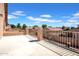 Expansive balcony with a view of the neighborhood and a clear blue sky overhead at 13965 N 135Th Dr, Surprise, AZ 85379