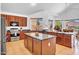 Open kitchen with granite countertops and stainless steel appliances at 13965 N 135Th Dr, Surprise, AZ 85379