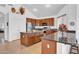 Spacious kitchen with granite countertops and stainless steel appliances at 13965 N 135Th Dr, Surprise, AZ 85379