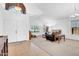 Spacious living room with vaulted ceilings and plenty of natural light at 13965 N 135Th Dr, Surprise, AZ 85379