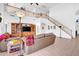 Inviting living room showcasing a media center and staircase at 13965 N 135Th Dr, Surprise, AZ 85379