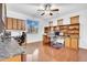 Bright office space with hardwood floors, built-in shelving, and two workstations at 13965 N 135Th Dr, Surprise, AZ 85379