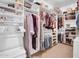 Organized walk-in closet with shelving and ample storage space at 13965 N 135Th Dr, Surprise, AZ 85379